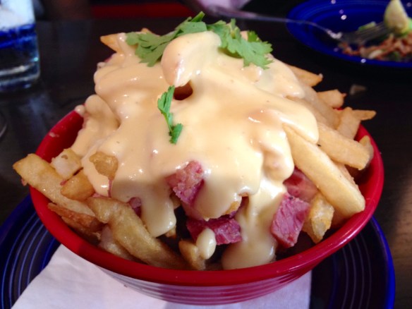 I don't know why they're called 'goofy fries', but I don't have any better suggestions.